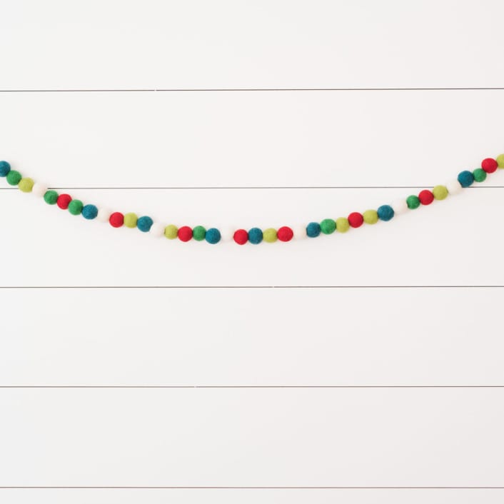 "Holly Berry Felt Ball Garland" - Garlands in multicolor by aubry bennion