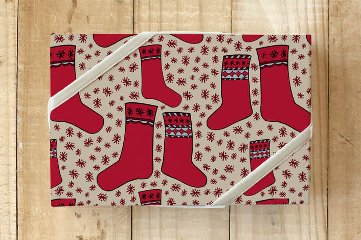 "Nordic Holiday Stockings " - Wrapping Paper in Scarlet by Lisa Travis - Front
