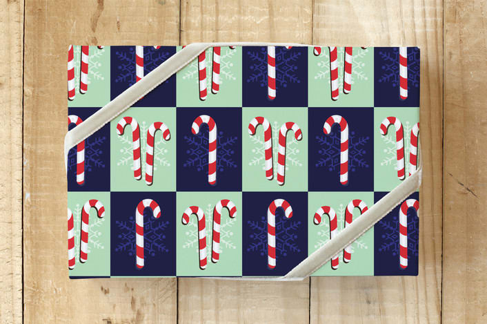 "Candy Canes and Snowflakes" - Wrapping Paper in Festive Red by Lisa Travis - Front