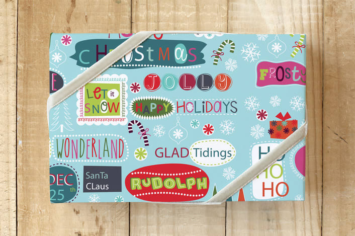 "Ho Ho Holidays" - Wrapping Paper in Light Blue by Angela Rekucki - Front