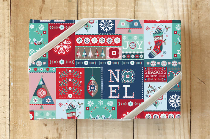"Holiday Quilt Wrap" - Wrapping Paper in Blue by Angela Rekucki - Front