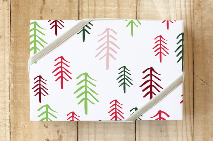"Scandanavian Forest" - Wrapping Paper in Candy Apple by Kristie Kern - Front