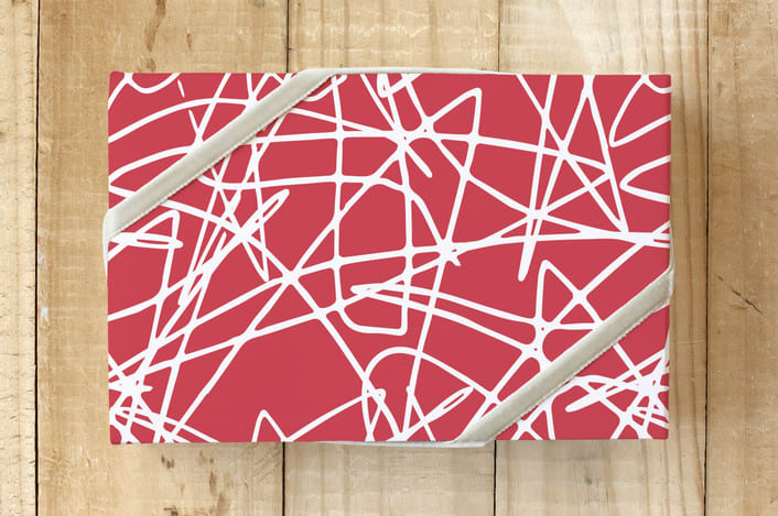 "Ice Tracks" - Wrapping Paper in Celebration Red by Jan Shepherd - Front
