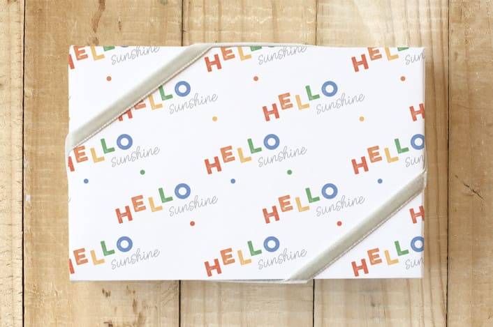"Rainbow Sunshine Wrap" - Wrapping Paper in Rainbow by Three Wings North - Front