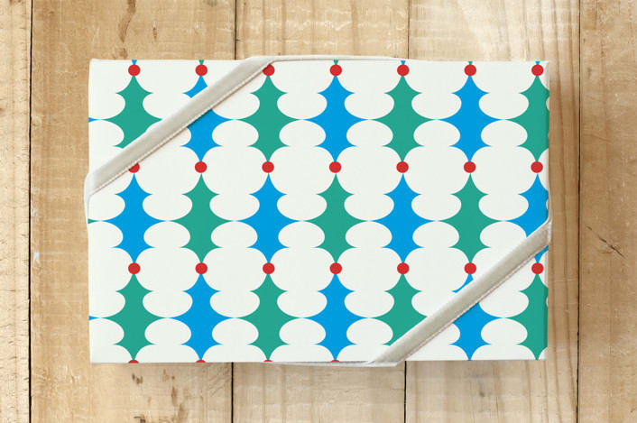 "Holly Leaves with Berries" - Wrapping Paper in Nougat by IGGI - Front