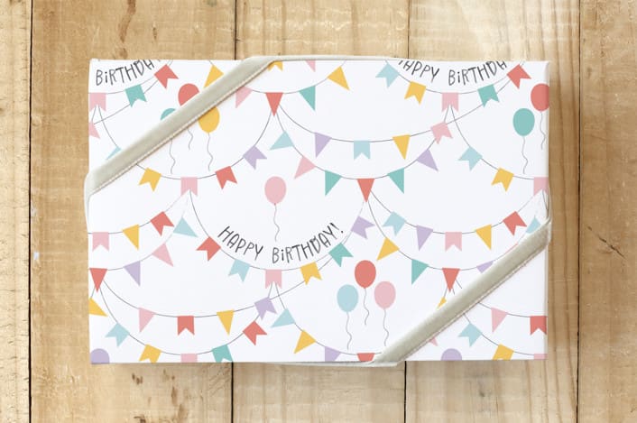 "Birthday Party Banner" - Wrapping Paper in White by Emanuela Carratoni - Front