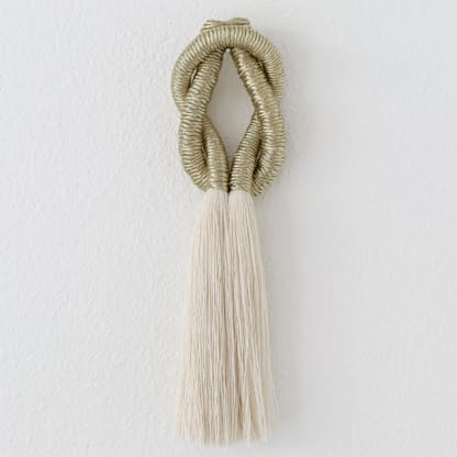 Small Love Knot wall sculpture in Gold