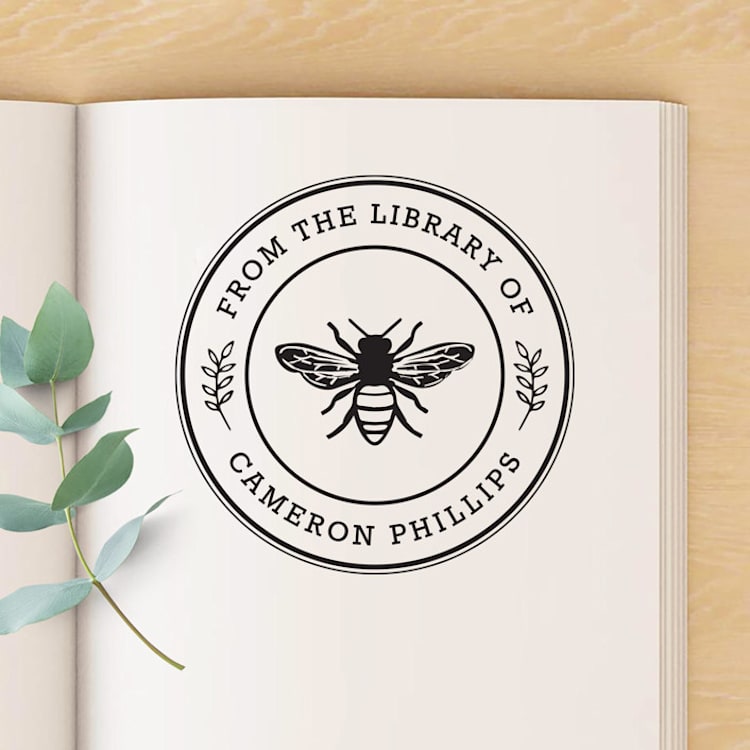 "Honey Bee Custom Name Book Stamp, Round Self Inking" - Book Stamp in black by Port of Reverie