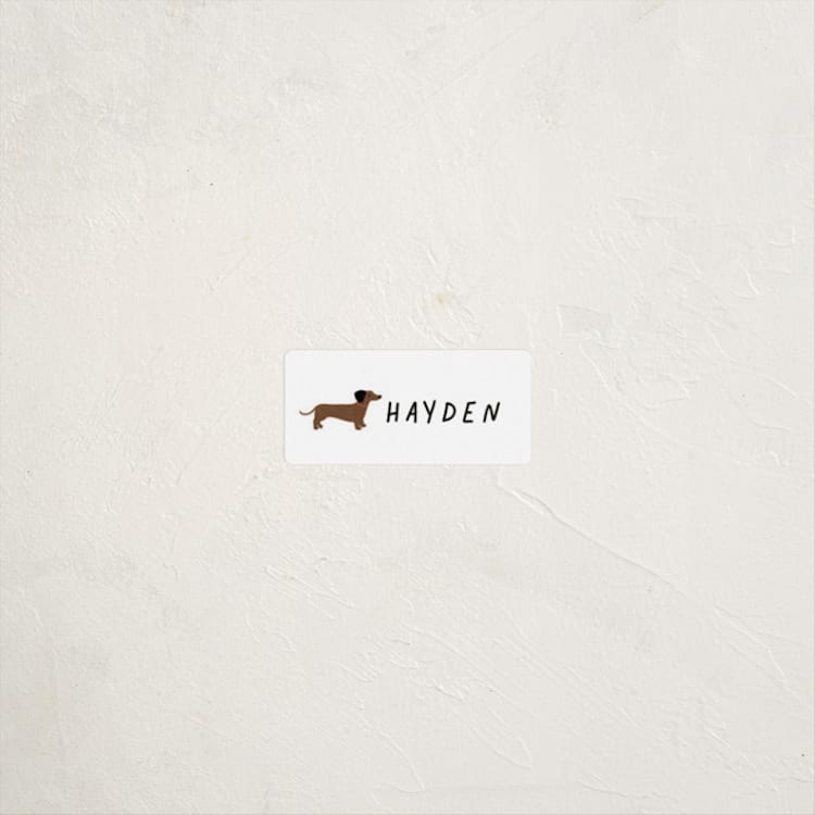 "Dachshund Pup" - Custom Name Labels in Tire by Laura Bercovich - Front