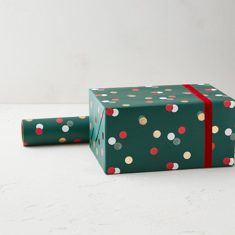 "Merry Dots" - Wrapping Paper Roll in Festive by Pixel and Hank