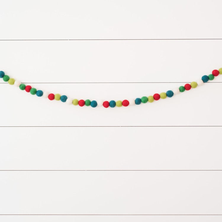 "Holly Berry Felt Ball Garland" - Garlands in multicolor by aubry bennion