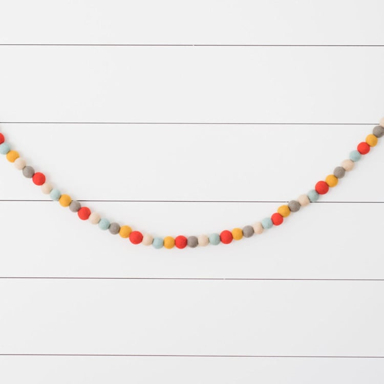 "Toy Soldier Felt Ball Garland" - Garlands in multicolor by aubry bennion