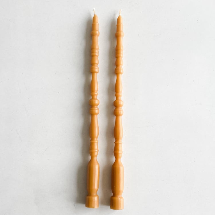 "SET OF 2 - SPINDLE LEG TAPERS // ORO" - Candles and Holders in yellow by borrowed BLU