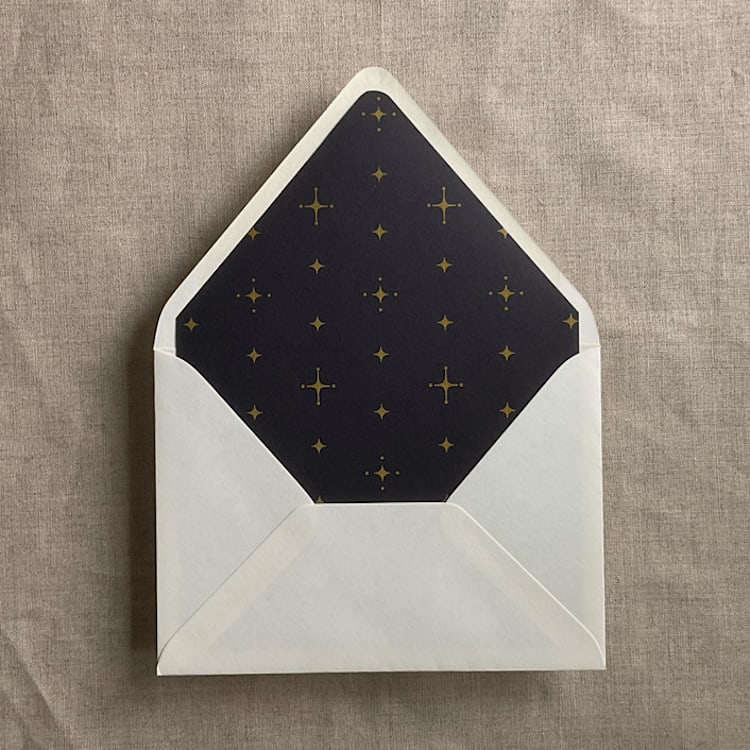 "Gold stars black envelope liner for A7 euro flap envelope | pack of 10" - Envelope Liners in black by Ivory Invitations