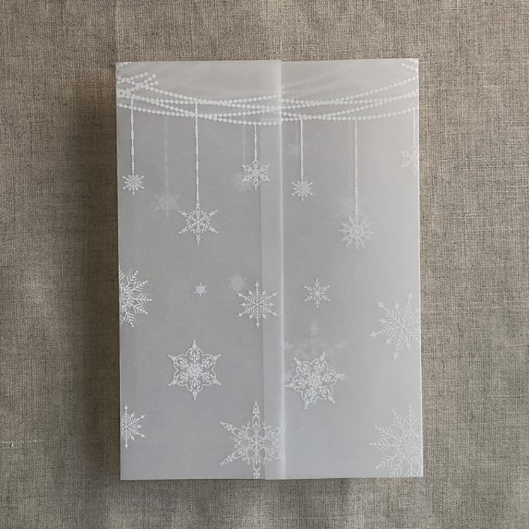 "White festive snowflake vellum wrap for 5x7 card | pack of 10" - Invitation Jackets and Overlays in white by Ivory Invitations