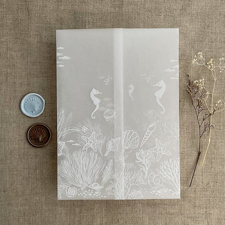 "White ink print under the sea illustration for destination wedding printed vellum wrap for 5x7 card | pack of 10" - Invitation Jackets and Overlays in white by Ivory Invitations