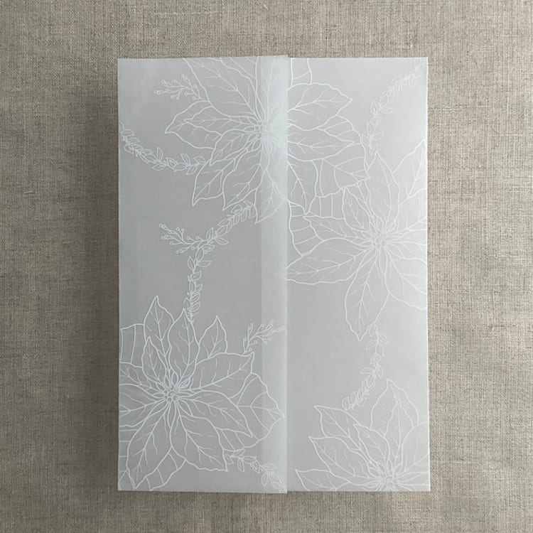 "White poinsettia vellum wrap for 5x7 card | pack of 10" - Invitation Jackets and Overlays in white by Ivory Invitations