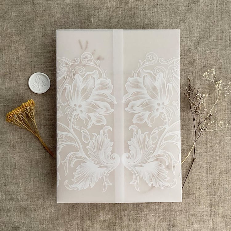 "White ink print Claudia vintage flourish printed vellum wrap for 5x7 card | pack of 10" - Invitation Jackets and Overlays in white by Ivory Invitations