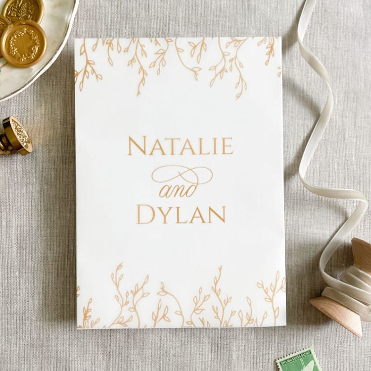 "Custom couple's names and botanicals in faux gold vellum wraps for invitations | Set of 10" - Invitation Jackets and Overlays in gold by Orchid Studio