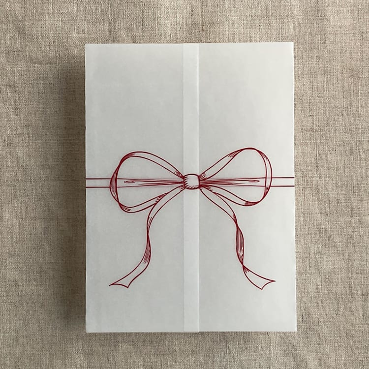 "Red ribbon bow printed vellum wrap for 5x7 card | pack of 10" - Invitation Jackets and Overlays in red by Ivory Invitations
