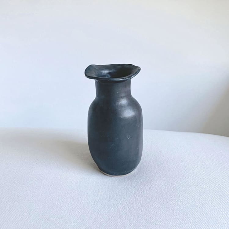 black petal vase by Cloude Made