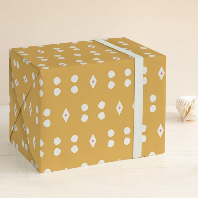 "Embark" - Wrapping Paper in Gold by Carrie ONeal - Front