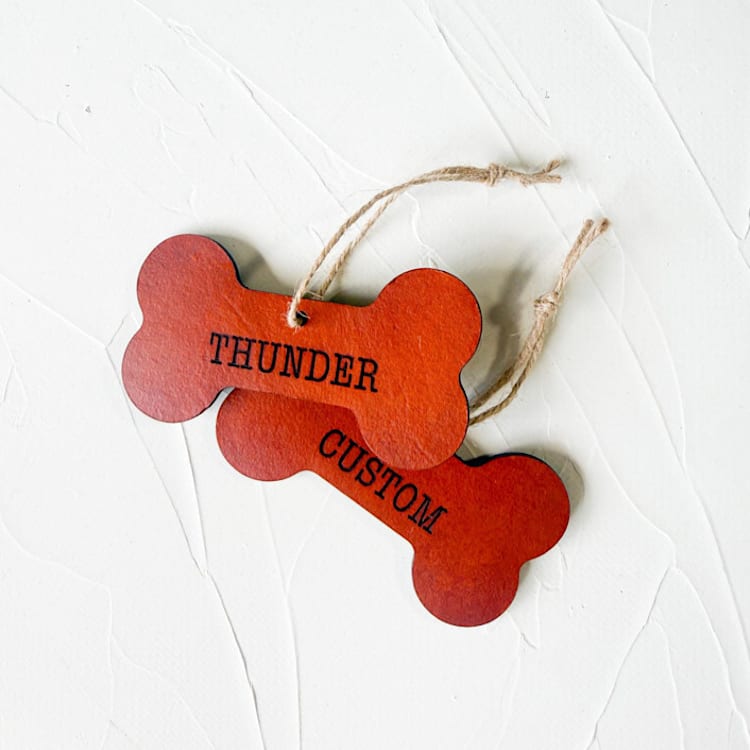 "Personalized Leather Dog Bone Ornament" - Ornaments in brown by Left Grain