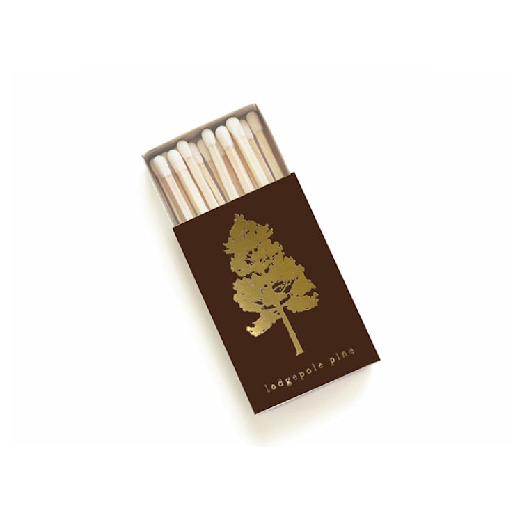 "Lodgepole Pine Tree Matchbox, Gold on Brown" - Matchbooks and Matches in brown by Jessica Cunningham