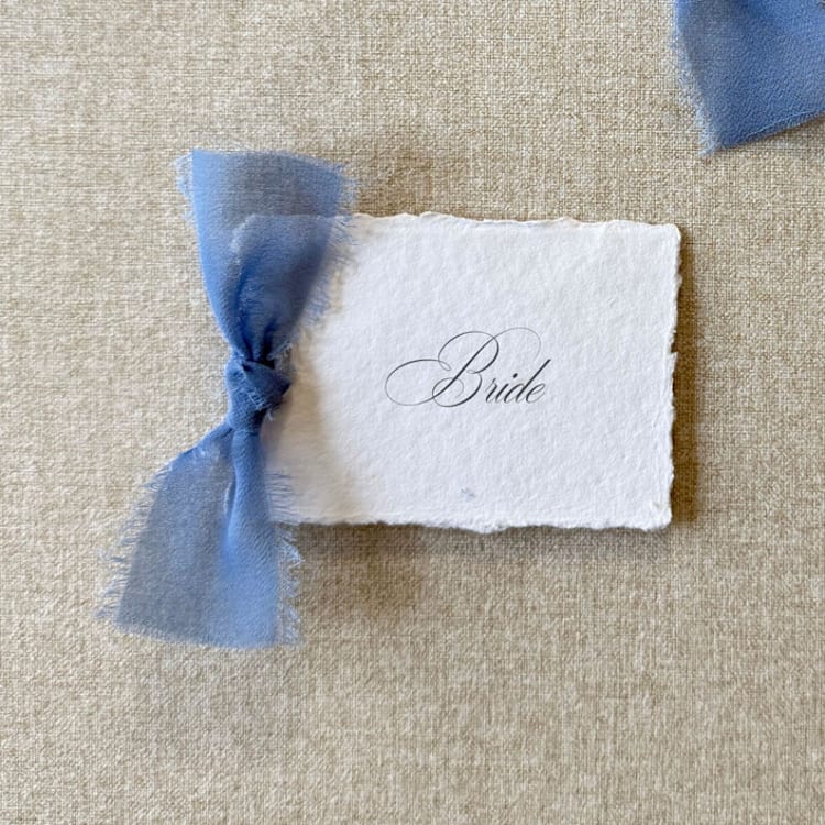 "Handmade Paper Place Cards with Dusty Blue Bow | Set of 10 | Custom Text" - Place and Escort Cards in blue by Cotton and Bow