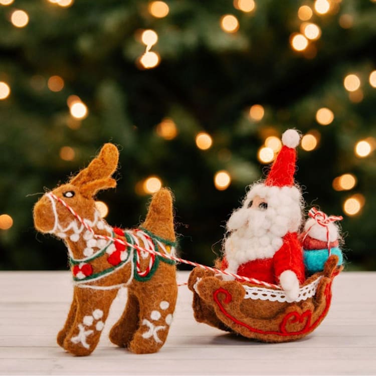 "Felt Santa Claus Sledging Holiday Figurine" - Christmas Decorations in red by Aahlada Chennupati