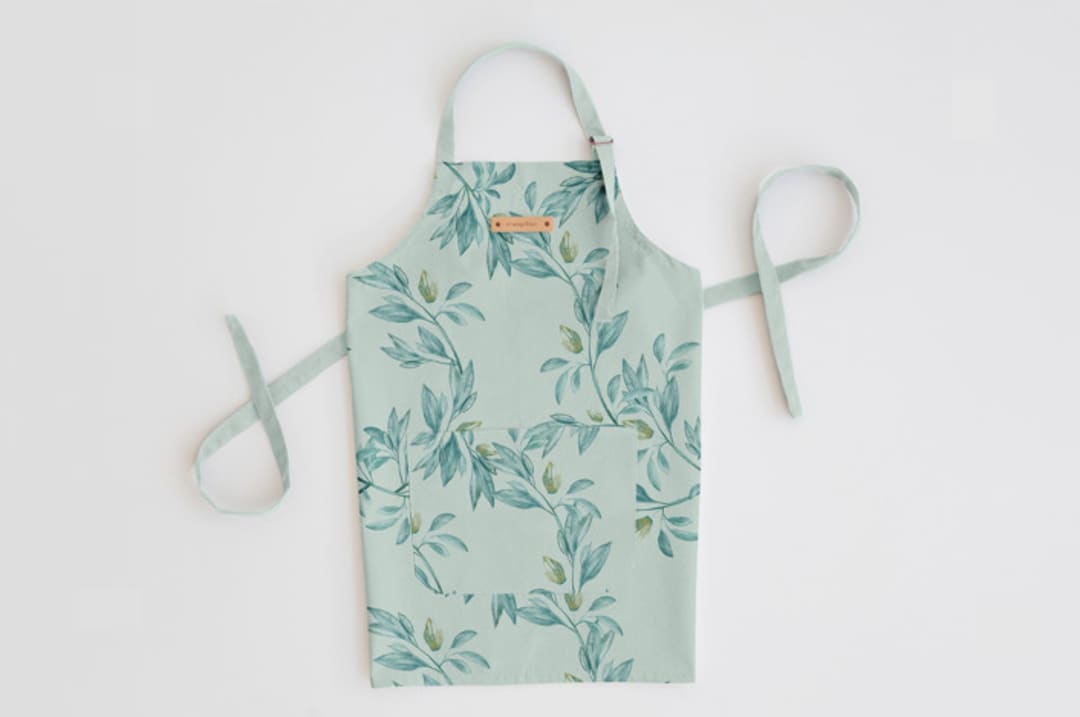 "Botanical greenery" - Apron in Greenery by Lucrecia Caporale - Personalizable Apron