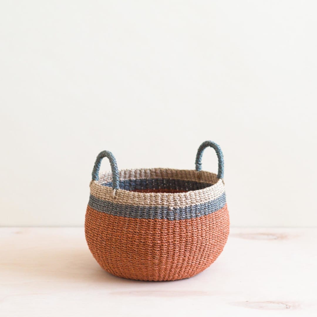 "Coral Bulge Basket" - Decorative Baskets in orange by LIKHA