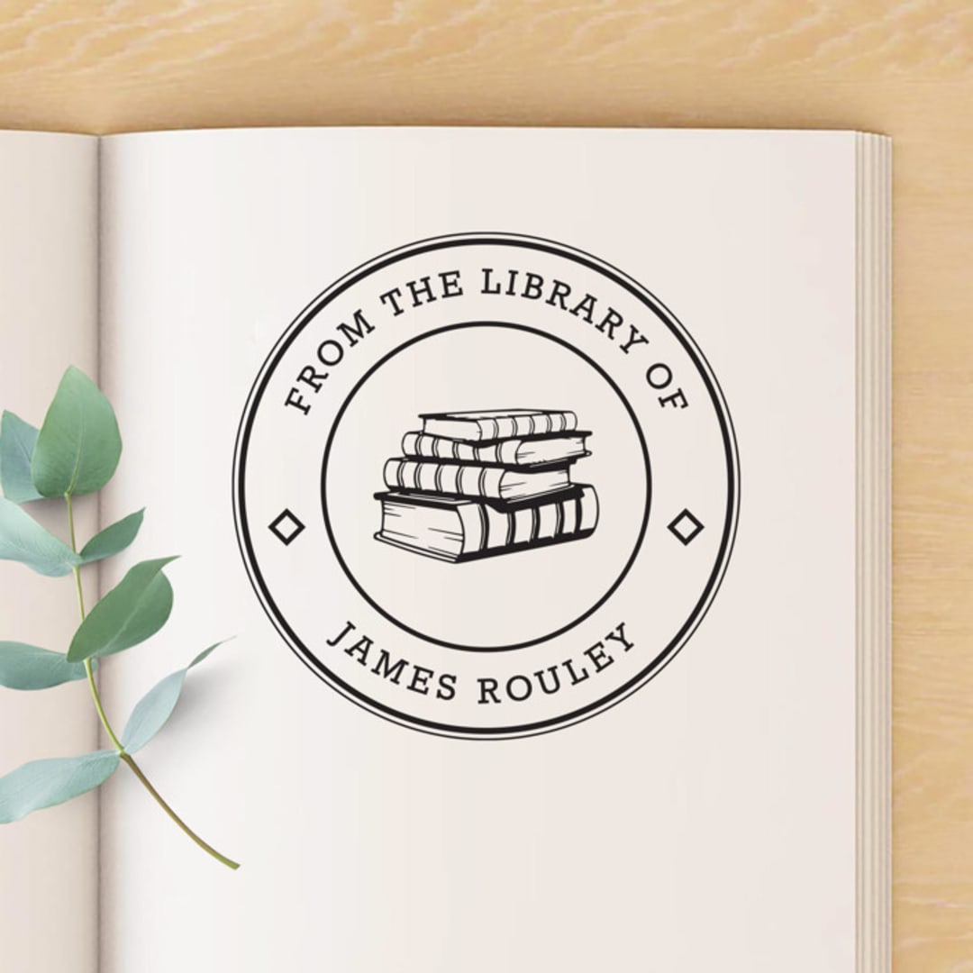 "Stack of Books Custom Name Book Stamp, Round Self Inking" - Book Stamp in black by Port of Reverie