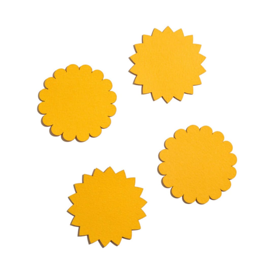 "Sunburst Felt Coasters (Set of 4)" - Coasters in yellow by ATELIER SAUCIER