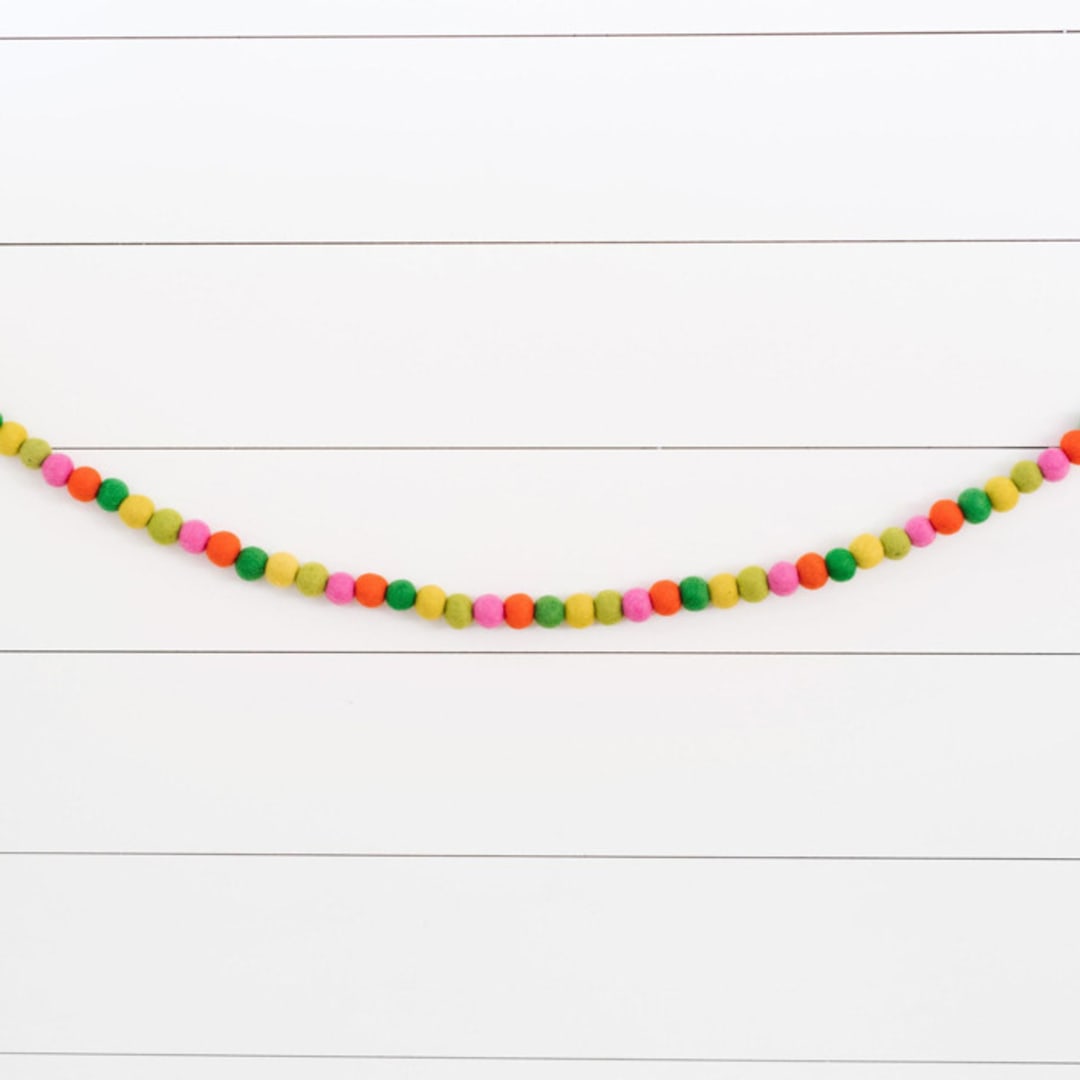 "Oh What Fun Felt Ball Garland" - Garlands in multicolor by aubry bennion