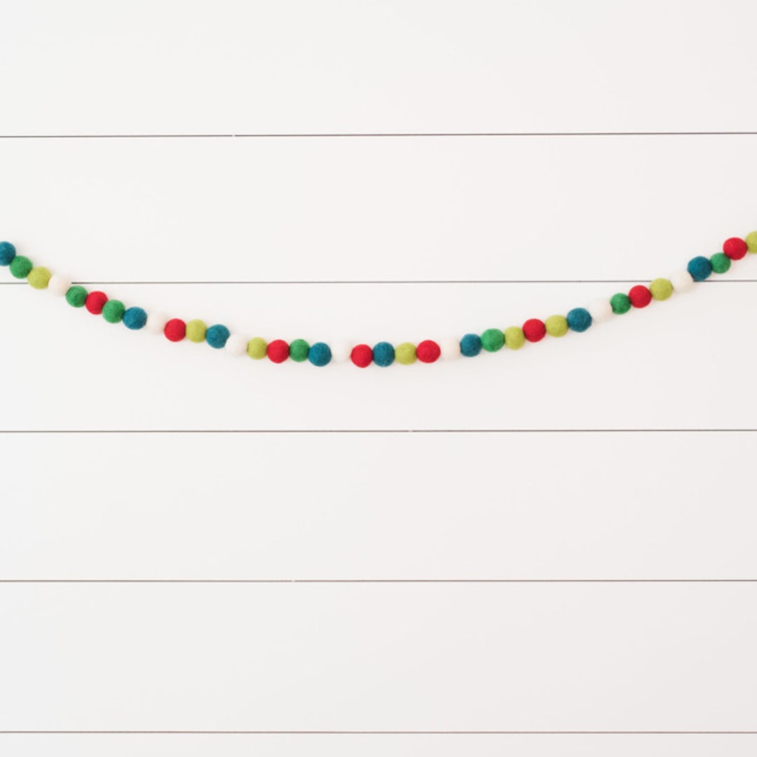 "Holly Berry Felt Ball Garland" - Garlands in multicolor by aubry bennion