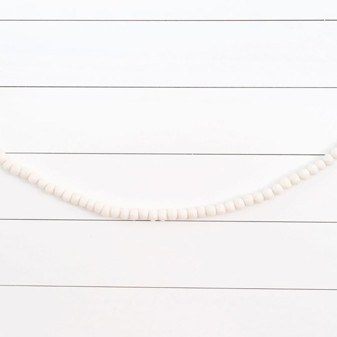 "Winter White Felt Ball Garland" - Garlands in white by aubry bennion