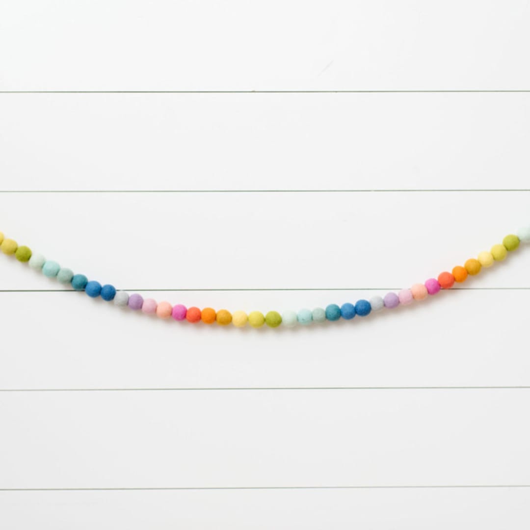 "Rainbow Bright Felt Ball Garland" - Garlands in multicolor by aubry bennion