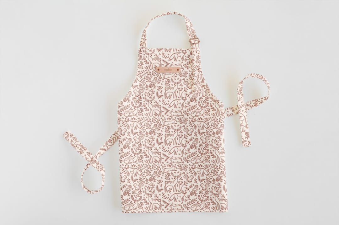 "Enchanted Holiday" - Personalizable Children's Apron in Cinnamon by Teju Reval - Personalizable Apron