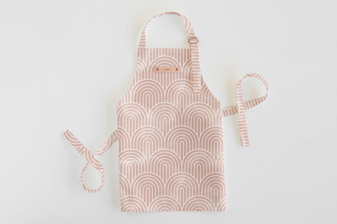 "Deco Arches" - Personalizable Children's Apron in Pink by Hooray Creative - Personalizable Apron