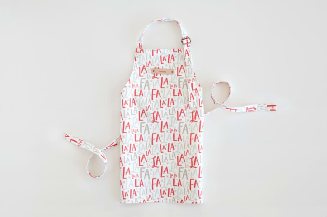 "Festive FaLaLa" - Personalizable Children's Apron in Red Berry by Hooray Creative - Personalizable Apron