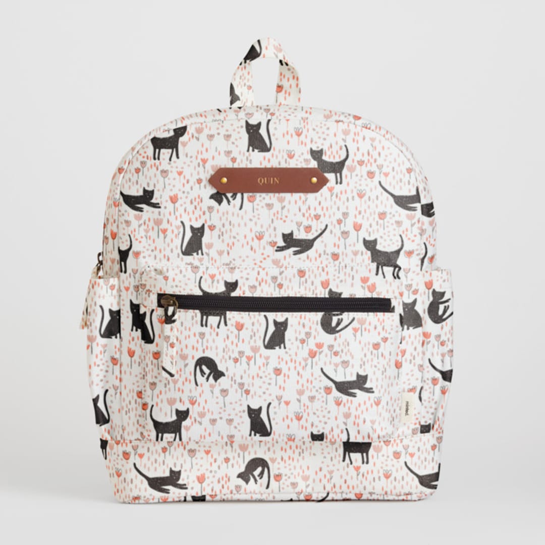 "Meadow Cats" - Small Backpack in Black Kitty by Betsy Siber - Front with Optional Personalization