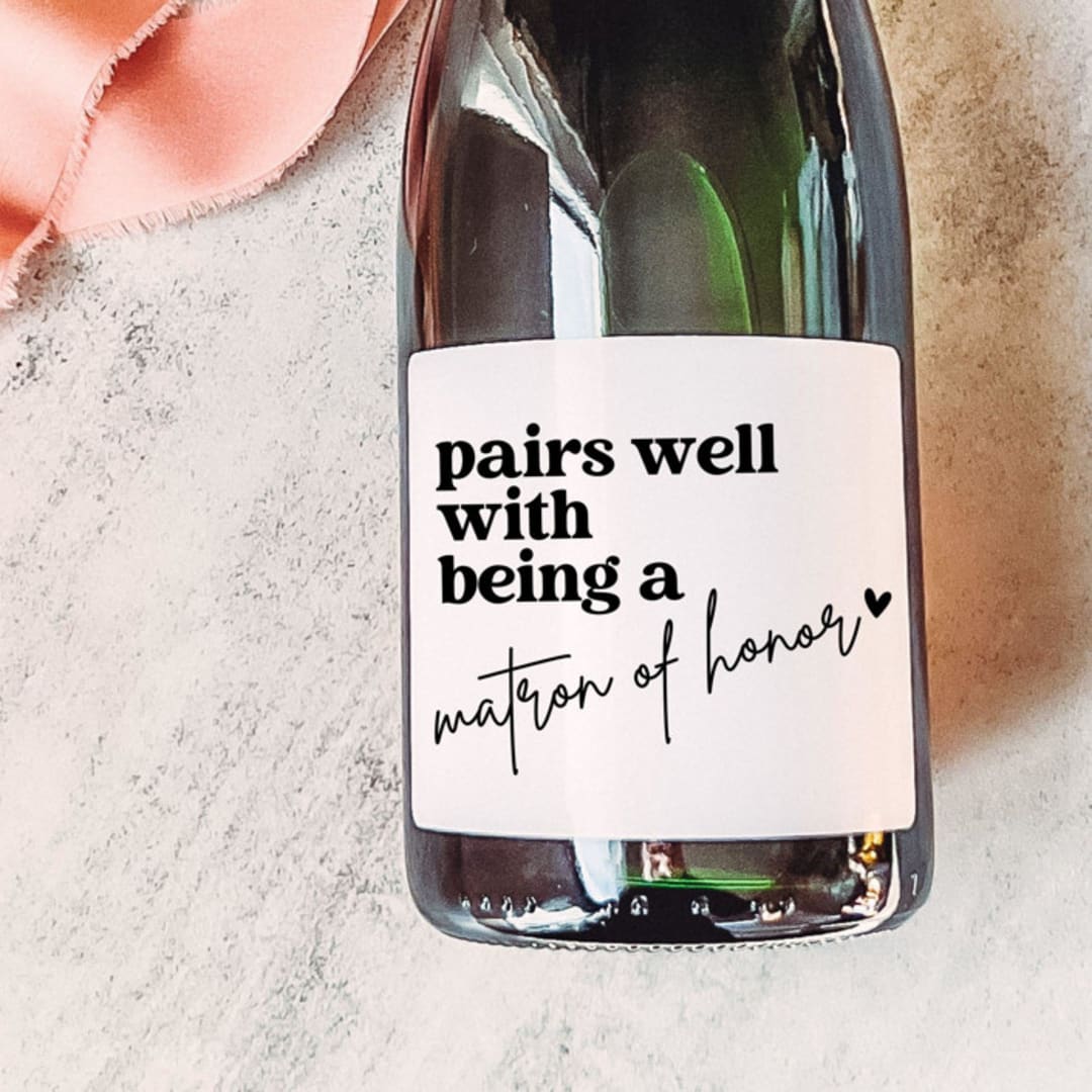 "Matron of Honor Gift Wine Label | Pairs well with being a Matron of Honor" - Bridesmaid Gifts in white by The Pretty Little Mess