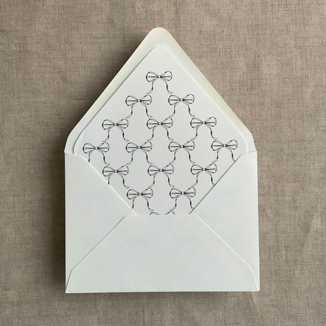 "Black ribbon bows printed envelope liner for A7 euro flap envelope | pack of 10" - Envelope Liners in black by Ivory Invitations