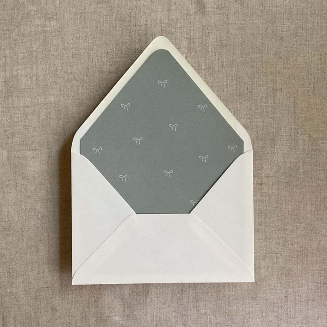 "Sage baby ribbon bows envelope liner for A7 euro flap envelope | pack of 10" - Envelope Liners in green by Ivory Invitations
