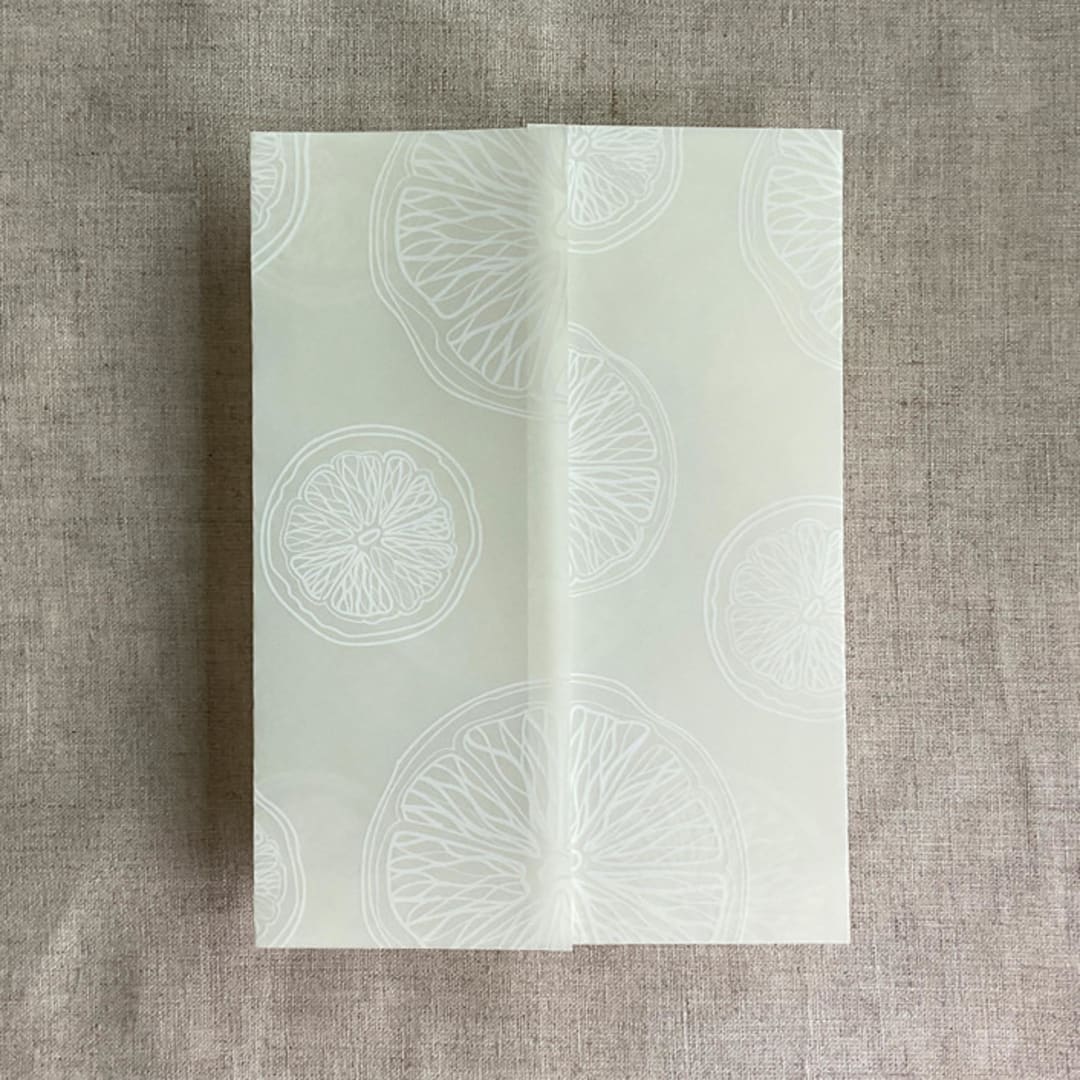 "Ivory citrus celebration white ink printed vellum wraps for 5x7 card | pack of 10" - Invitation Jackets and Overlays in natural by Ivory Invitations