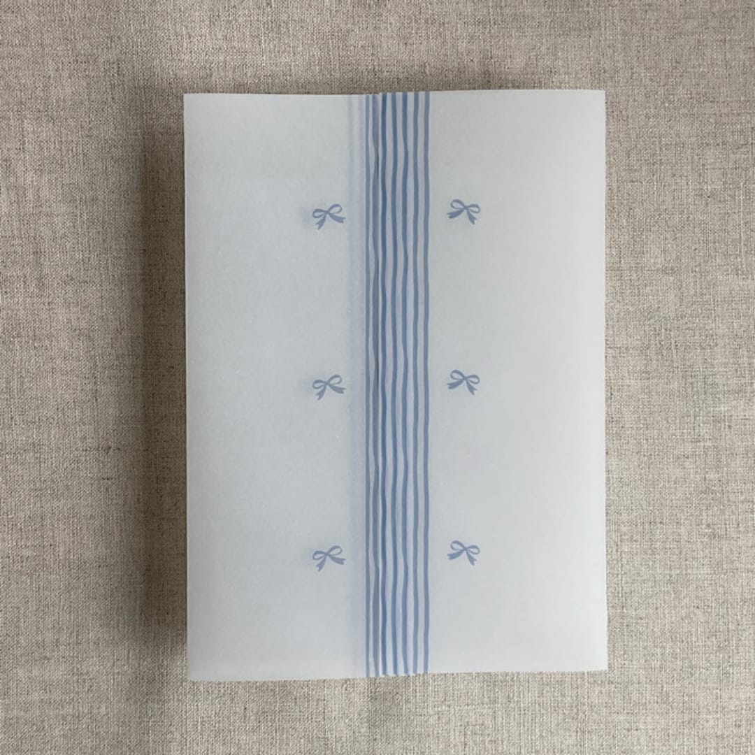 "Blue ribbons printed vellum wraps for 5x7 card | pack of 10" - Invitation Jackets and Overlays in blue by Ivory Invitations
