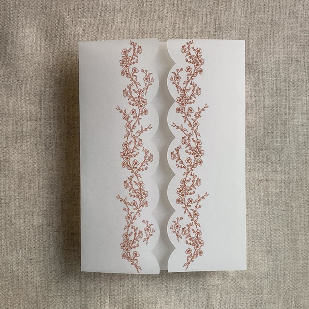 "Rust floral printed scallop edge vellum wrap for 5x7 card | pack of 10" - Invitation Jackets and Overlays in copper by Ivory Invitations