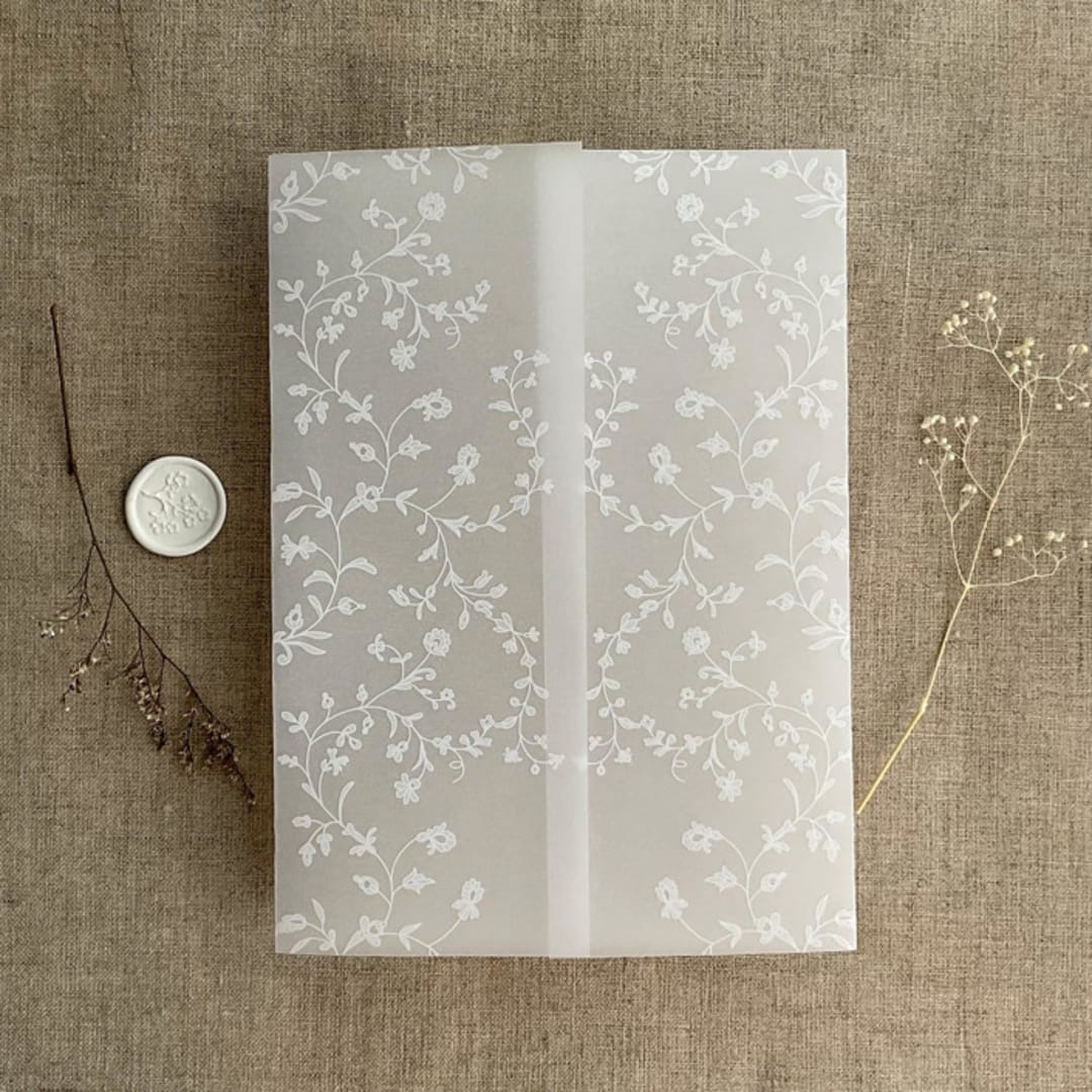 "White ink print dainty floral vines printed vellum wrap for 5x7 card  | pack of 10" - Invitation Jackets and Overlays in white by Ivory Invitations