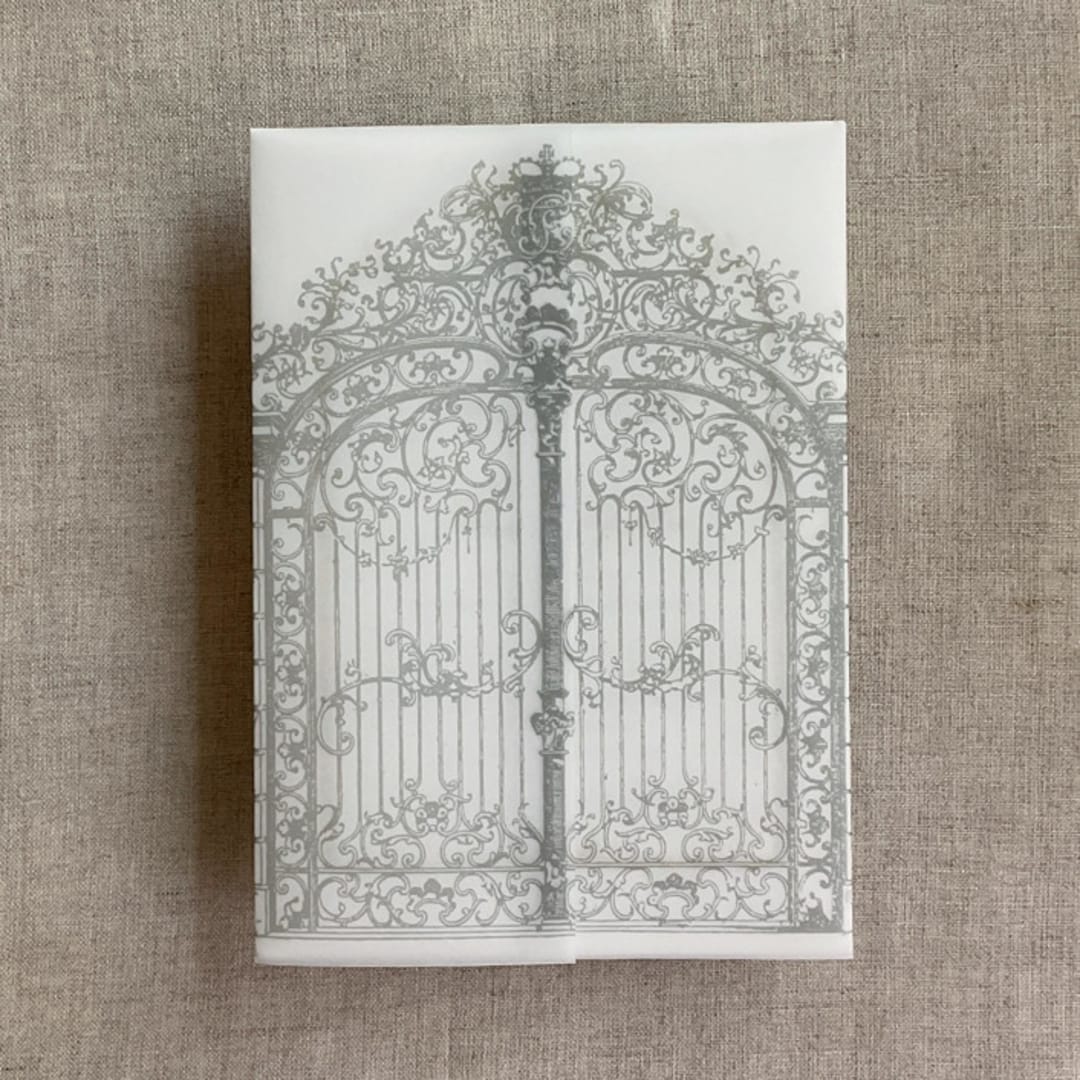 "Oyster vintage arched gate printed vellum wrap for 5x7 card | pack of 10" - Invitation Jackets and Overlays in gray by Ivory Invitations